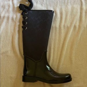 Coach women’s black tristee lace up rain boots
